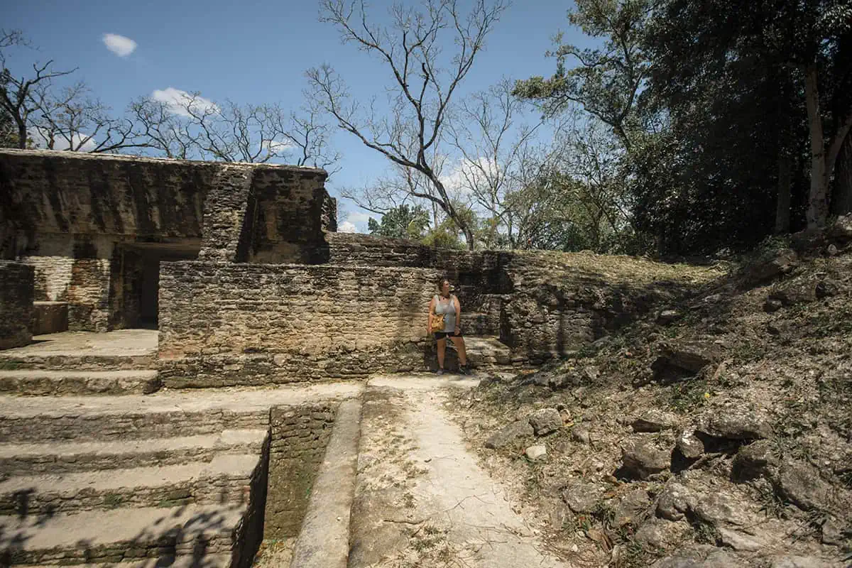 Cahal Pech Mayan Ruins In San Ignacio: A Hidden Gem Away from the Crowds 10 tasha amy admiring the impressive grandeur of the ruins at cahal pech