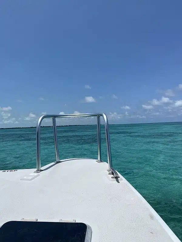 The scenic view of the ocean from the back of a boat sailing from Caye Caulker to Belize City.
	