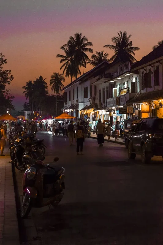 sunset down the main walking street in luang prabang