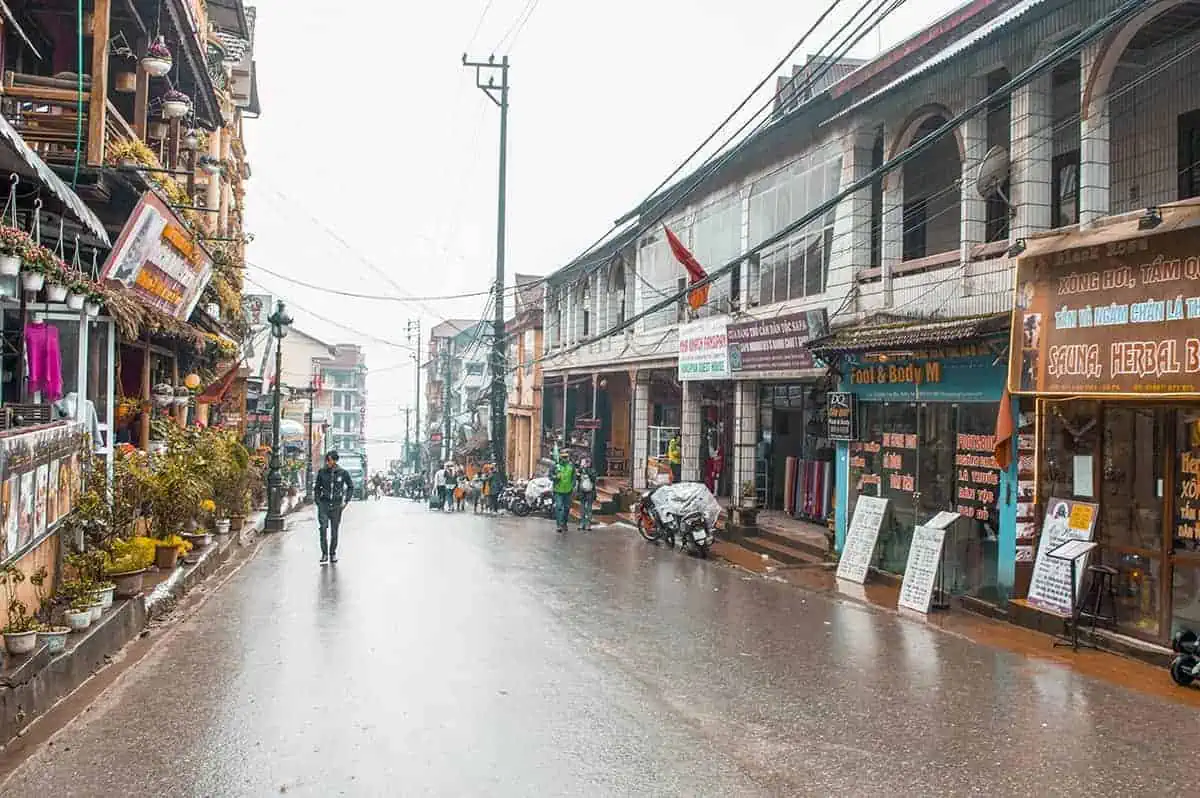 rainy day in sapa town walking through one of the main streets