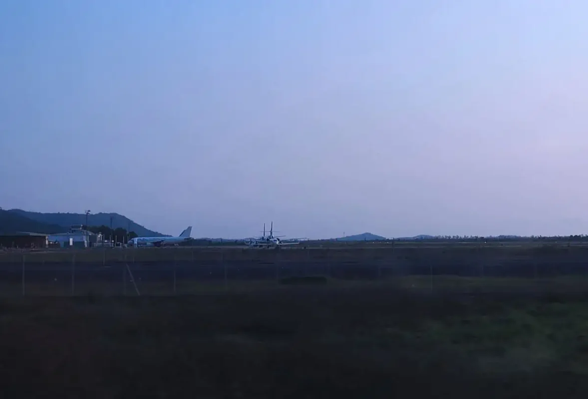 driving past sihanoukville airport at dusk