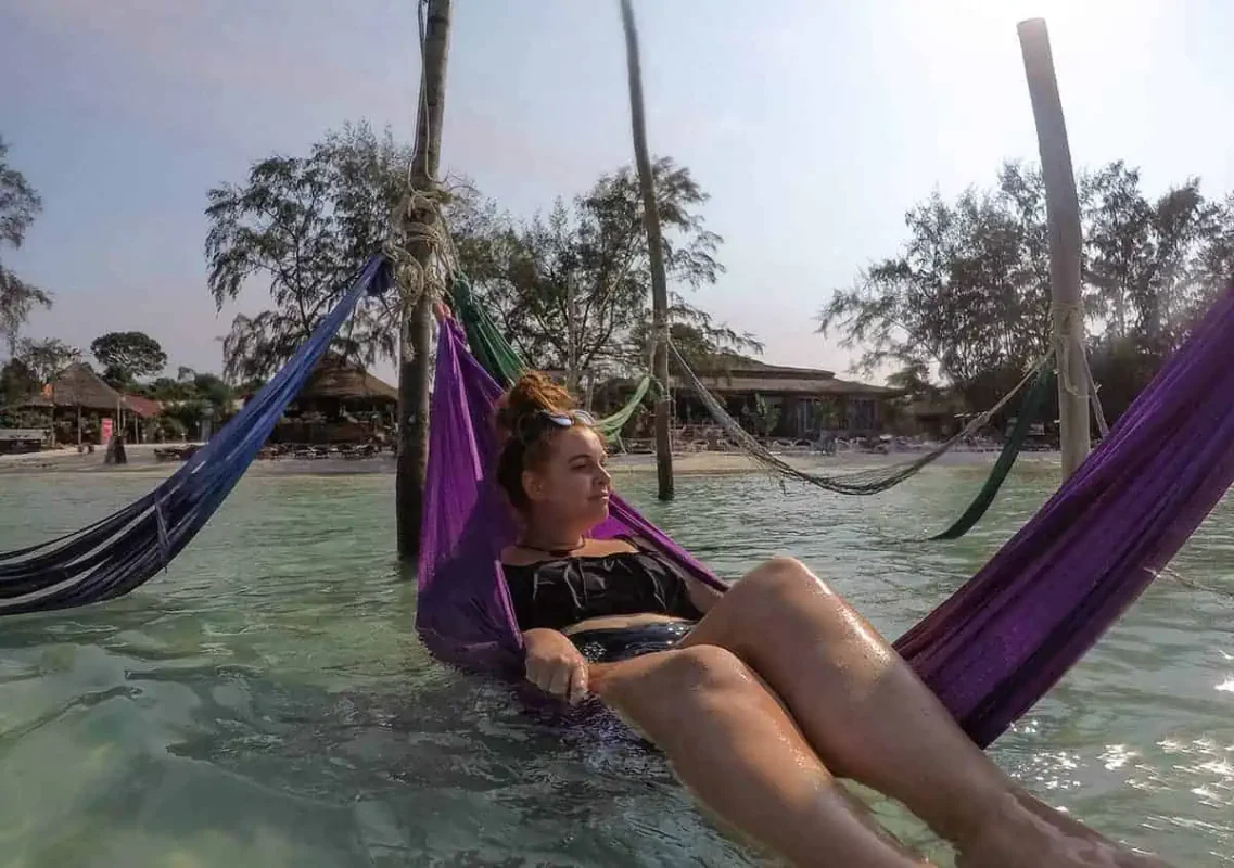 relaxing on the hammocks at saracen bay in koh rong samloem