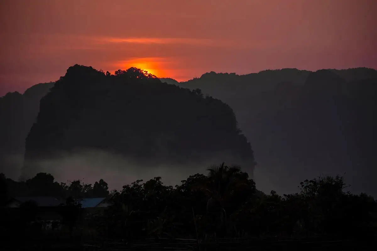 sunset over the moutains in tham kong lo