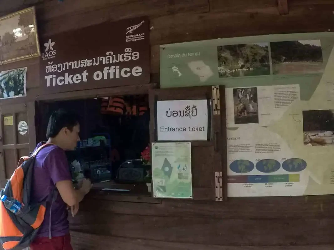 purchasing our entry ticket to konglor cave in laos