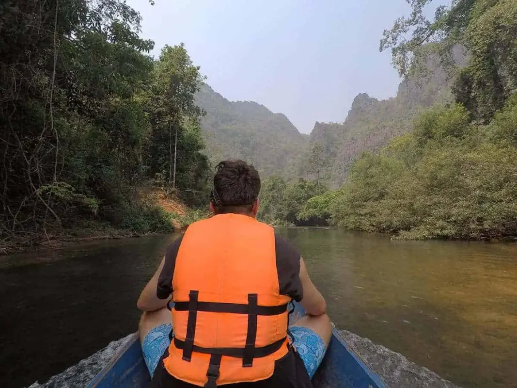taken a wooden longtail boat through the jungle in laos