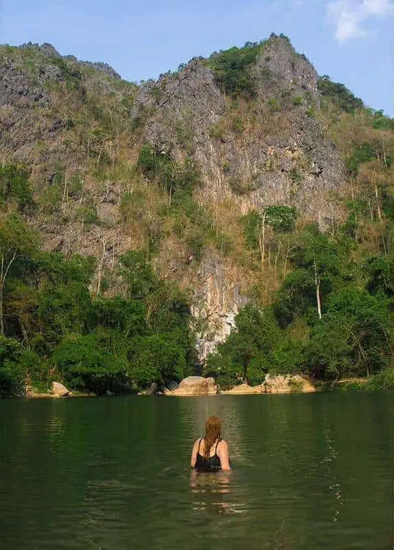 swimming in the nam hin bun river around kong lor laos