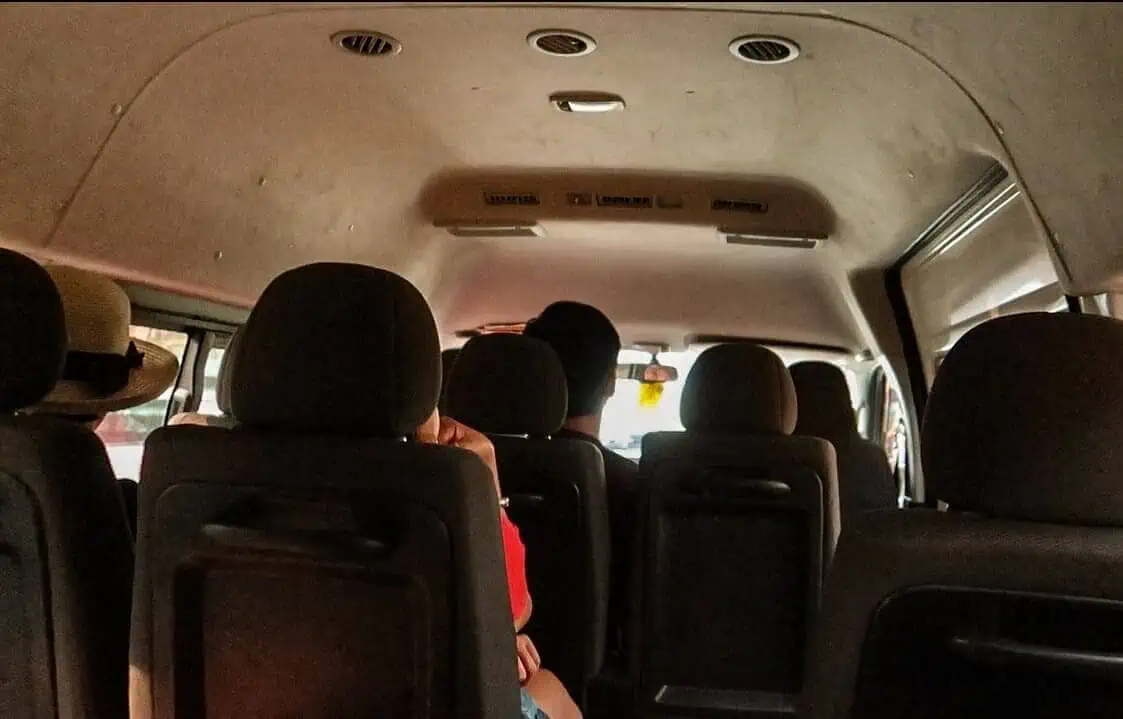 inside a shared shuttle from luang prabang to vang vieng laos
