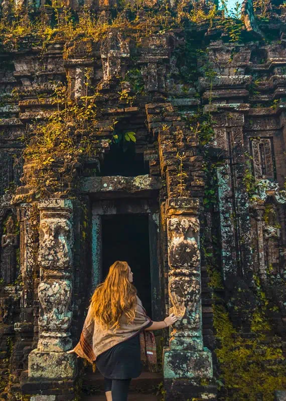 My Son Sanctuary Hoi An: BEST Tips & Tours (2025) 19 tasha amy in front one of the temples at my son sanctuary vietnam