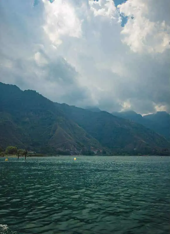 Panajachel To San Pedro & The Towns Between: How To Travel Around Lake Atitlan 36 the afternoon clouds rolling in while traveling back rom san pedro to panajachel