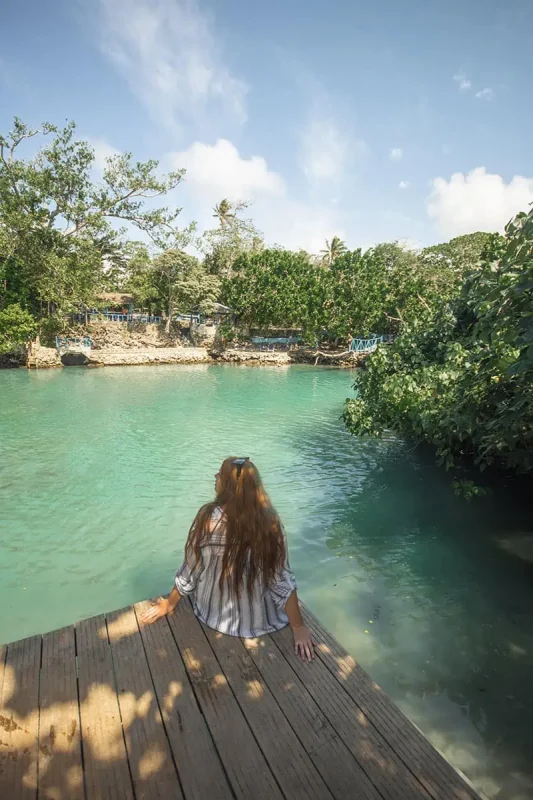 Port Vila Blue Lagoon: BEST Tips For Visiting 2025 5 tasha amy chilling in a quieter spot at the blue lagoon vanuatu