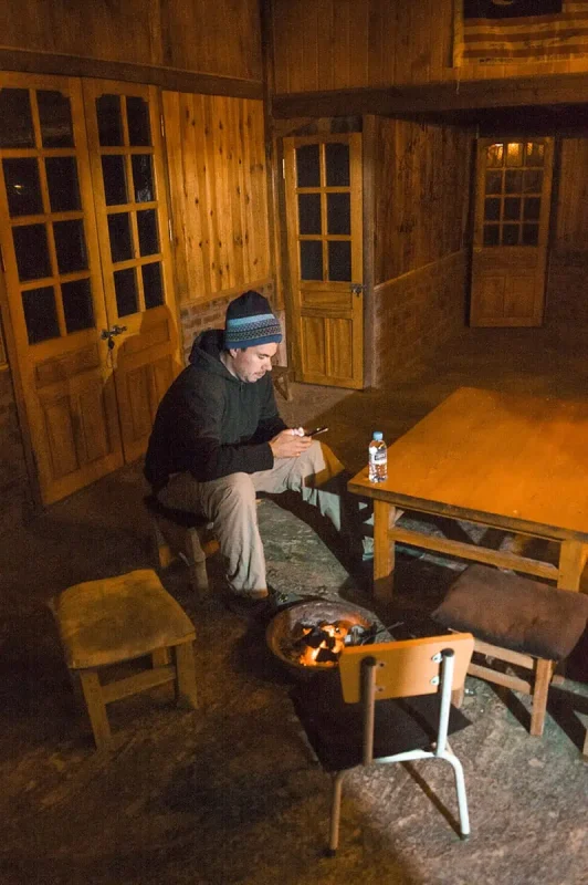 warming up over a fire at our homestay in sapa
