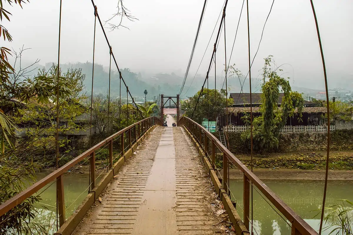 walking over the main bridge into ta van vietnam