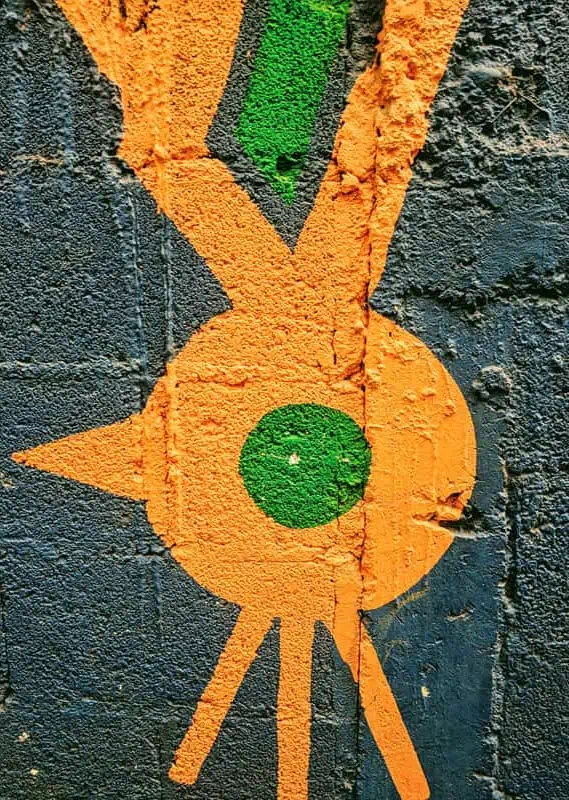 Panajachel To San Pedro & The Towns Between: How To Travel Around Lake Atitlan 32 checking at the street art at santa catarina palopó