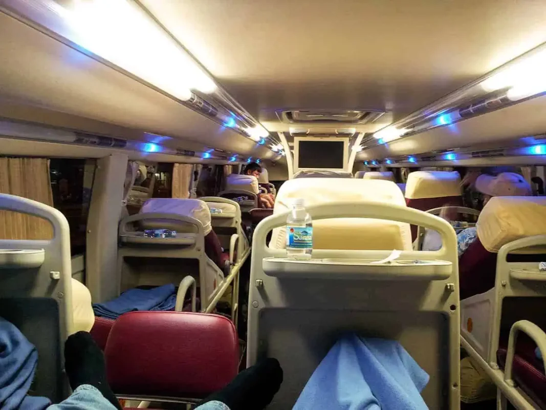 Taking A Vietnam Sleeper Bus: BEST Tips For Travelers 2025 10 evening ambiance inside the sleeper bus with travelers packed in
