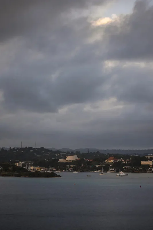 stormy skies rolling over while looking over at port vila from our cruise ship
