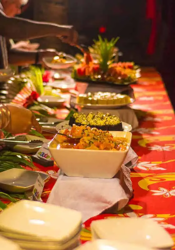Where To Eat In Rarotonga: BEST Restaurants & Cafes 2025 24 Buffet spread with a variety of local dishes, a highlight of Te Vara Nui offering an authentic taste of the island's culinary delights.