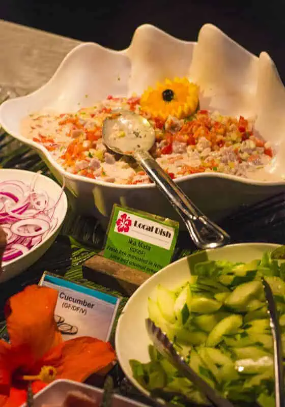 Where To Eat In Rarotonga: BEST Restaurants & Cafes 2025 25 Traditional Polynesian raw fish salad, Ika Mata, served at Te Vara Nui, showcasing the unique flavors of places to eat in Rarotonga